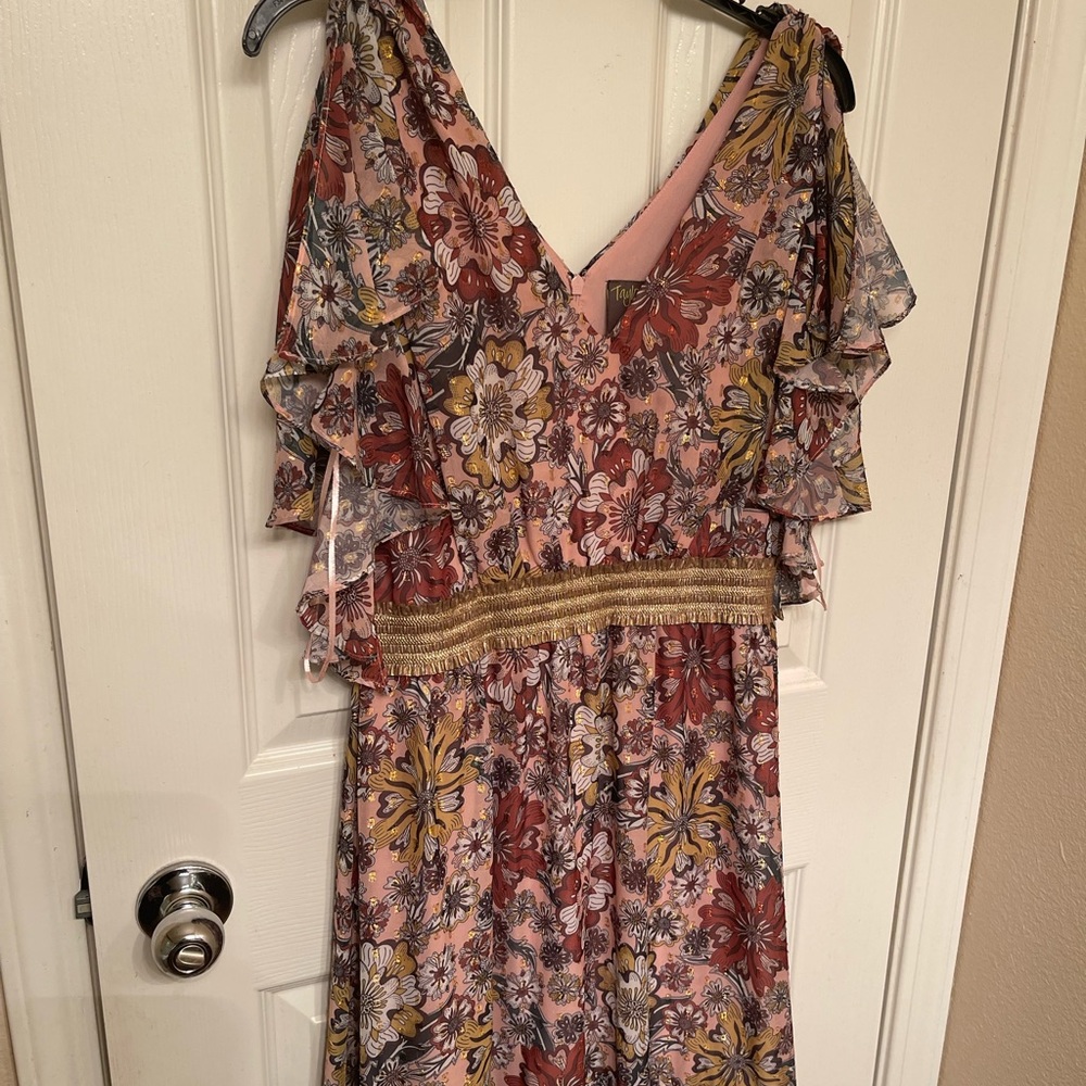 Pink flutter sleeve dress.